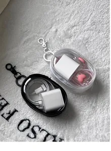 Portable transparent storage pouch for electronic chargers and data cables in black and white