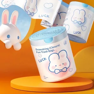 Detail view of cute blue heart rabbit drawstring trash bags in a convenient roll.