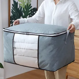Grand sac de rangement gris en tissu non tissé matelassé pour couettes et literie