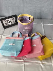 Dopamine-style contrast mesh cosmetic bags in multiple vibrant colors for travel.