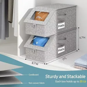 Vista detallada de la caja de tela gris para sombreros con dimensiones y capacidad.