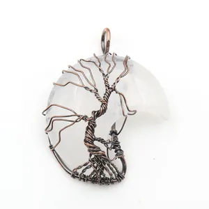 Handmade Tree of Life wire-wrapped pendant with a crescent moon natural stone detail.