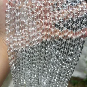 Macrodetail van natuurlijke Braziliaanse bergkristal twist kralen 6x8mm voor sieraden