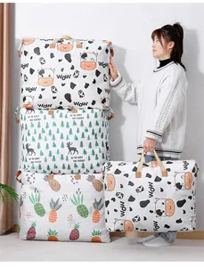 Extra large capacity storage bags for quilts and moving shown with model for scale