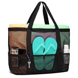 Large mesh beach tote bag with pockets for towels and outdoor essentials