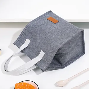 Insulated cationic fabric lunch bag with thick aluminum foil lining for work or school