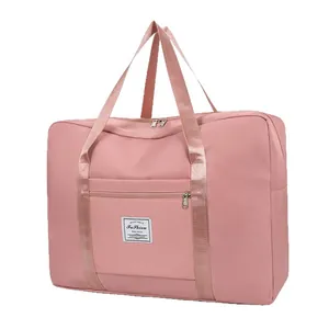 Large capacity pink travel storage duffel bag for clothes and luggage organization