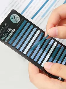 Close-up of a translucent blue index tab being peeled from a 300-sheet set.