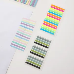 Top view of narrow multi-colored sticky index tabs in various aesthetic palette sets