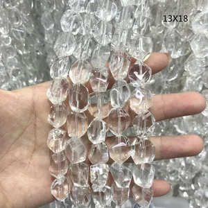 Detail showing clear irregular faceted natural Brazilian white crystal beads strands