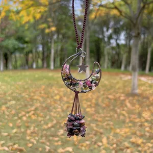 Handmade bohemian moon pendant featuring colorful crushed natural stones and star.