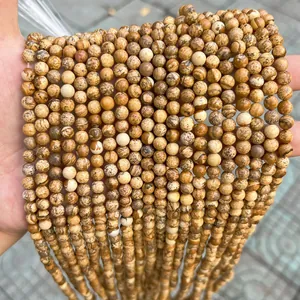 Macro view of natural Picture Jasper round loose beads for DIY jewelry bracelet making