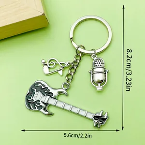 Detailed dimensions of silver music-themed keychain with guitar and microphone