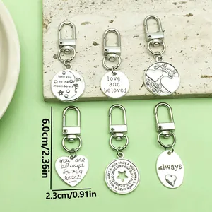 Inspirierende Schlüsselanhänger in Antik-Silber für Taschen, Herz- und Rundanhänger