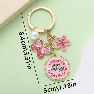 Llavero de esmalte rosa mariposa flor regalo día de la madre tamaño 8,4 cm x 3 cm