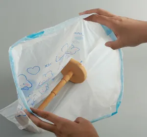 Detail view of thickened cartoon printed garbage bag showing drawstring and capacity