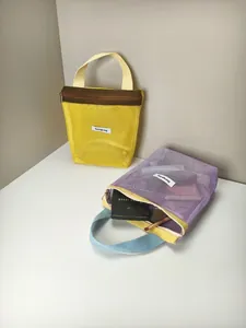 Vibrant summer color-block mesh cosmetic bags showing handheld design and storage space