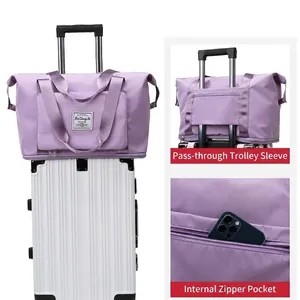 Bolsa de viaje plegable morada grande con funda para equipaje