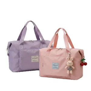 Bolsas de viaje plegables de gran capacidad con separación seco-húmedo en rosa y lila