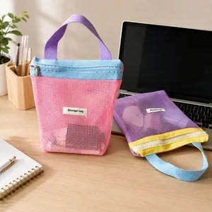 Colorful dopamine style mesh storage bag for portable summer travel cosmetics and toiletries