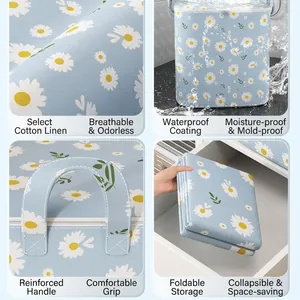 Große Aufbewahrungstasche mit Gänseblümchen-Print, wasserdicht und faltbar für Kleidung.