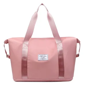 Large capacity foldable dry and wet separation travel duffel bag in pink finish