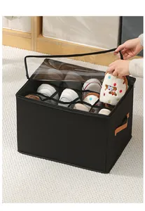 Detail view of black foldable shoe storage box with 12 compartments and clear lid