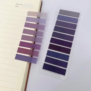 Vista detallada de pestañas de índice PET translúcidas en degradado morado Morandi en papel
