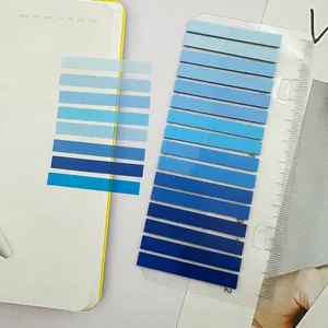 Detail view of blue gradient PET transparent waterproof index sticky notes for books.