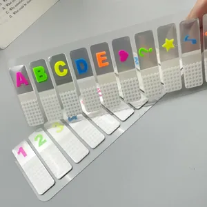 Gedetailleerd overzicht van kleurrijke 3D transparante indextabs met neon letters.