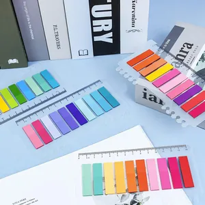 Detail view of colorful translucent index tabs with integrated ruler markings