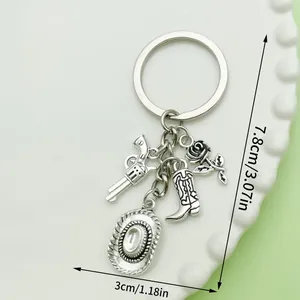 Silver western cowboy keychain showing size measurements 7.8cm by 3cm in detail view