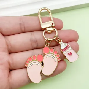 Cute baby bottle and pink footprint enamel alloy keychain charm for bags and cars