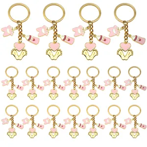 Set of 18 decorative pink baby shower keychains with baby bottle and tiny feet charms