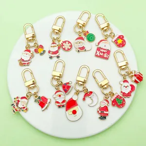 Weihnachten Cartoon Schlüsselanhänger Legierung Emaille Weihnachtsmann Baum Glocke Schneeflocke Anhänger Süß Xmas Tasche Hängende Dekoration Party Geschenk