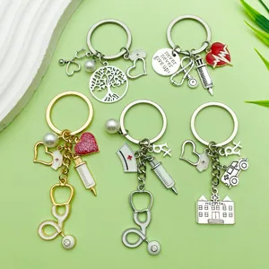 Detailed view of creative medical-themed keychains with stethoscope and syringe charms