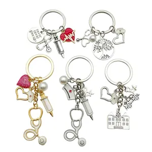 Set of medical themed keychains featuring heart, stethoscope, syringe and nurse hat charms