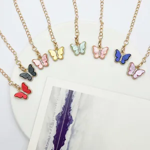 Colorful enamel butterfly keychains with rhinestone accents and lobster clasp chains
