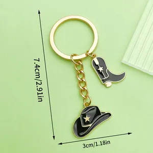 Detailed view of black enamel western cowboy hat and boot keychain with size markers
