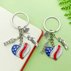 Close-up of US flag heart keychain with Statue of Liberty and Big Ben charms