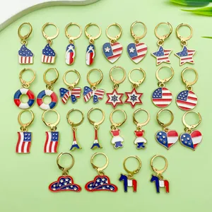 Detailed view of patriotic alloy earrings collection featuring USA flag colors and stars.