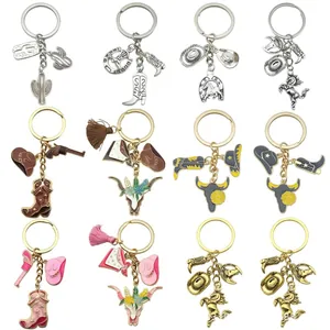 Western cowboy themed keychain collection featuring hats, boots, and horseshoe charms