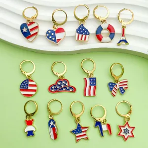 Detail view of assorted Independence Day themed enamel earrings in US flag colors