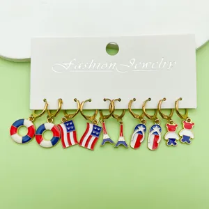 Set of enamel hoop earrings with Independence Day themed red white and blue charms