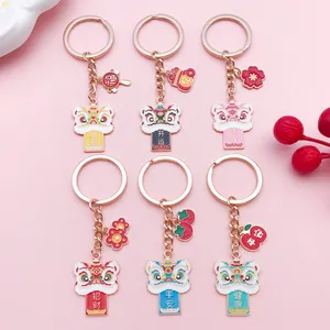 Detailed set of six Chinese lion dance keychains with traditional lucky charms