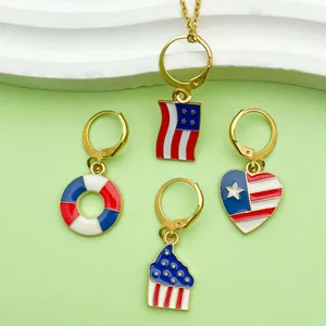 Macro detail of American flag themed enamel drop earrings for Independence Day jewelry