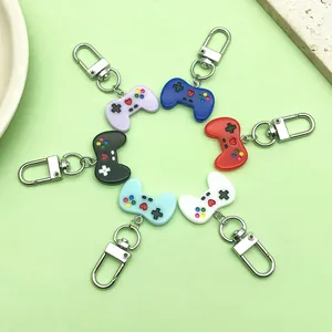 Vielfalt an Mini-Game-Controller-Schlüsselanhängern in bunten Farben mit Karabiner