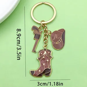 Porte-clés cowboy occidental avec breloques chapeau, botte et revolver en émail.