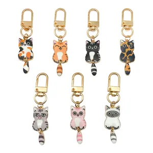 7er-Set niedliche Emaille-Katzen-Schlüsselanhänger mit beweglichem Schwanz für Taschen