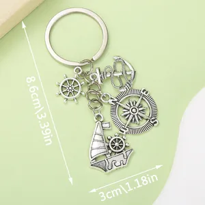 Llavero de metal de tema náutico con velero, ancla y brújula, longitud de 8,6 cm